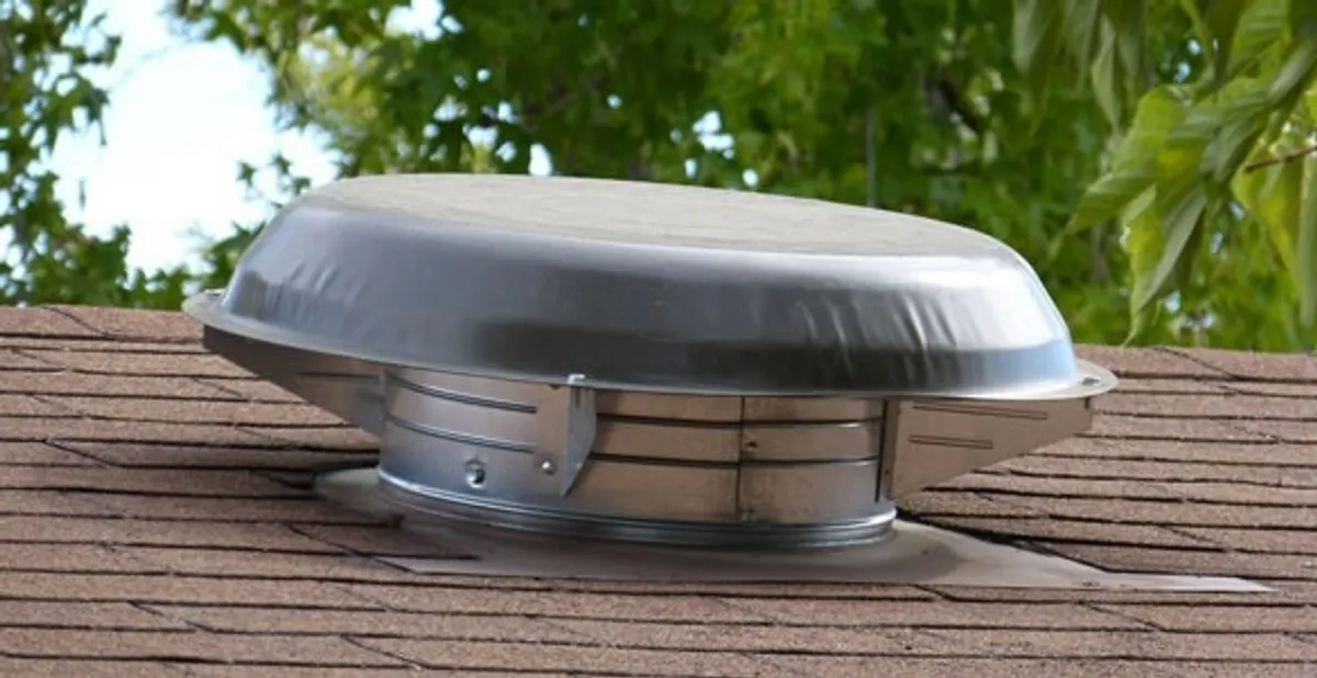 attic fan installation services with low-profile roof ventilation unit in Lakeland, FL