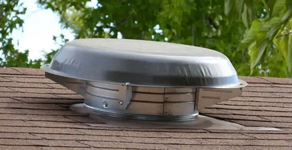attic fan installation services with low-profile roof ventilation unit in Lakeland, FL