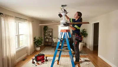 Electrician installing a ceiling fan in a Lakeland, FL home for reliable cooling and airflow