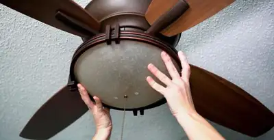 Ceiling fan repair and reinstallation on ceiling mount in Lakeland, FL