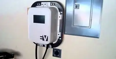 Electric car charger installation with wall-mounted EV charging station in Lakeland, FL