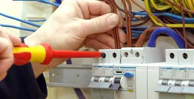 electrician services performing professional electrical panel wiring and connections in Lakeland, FL