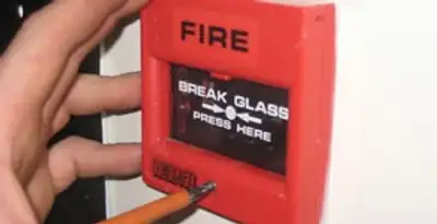 fire alarm installation service showing manual fire alarm pull station installed by licensed electricians in Lakeland, FL