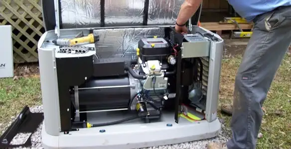 generator installation service showing technician connecting and configuring generator components in Lakeland, FL