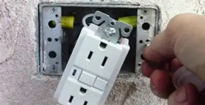 gfci circuits service showing installation of a ground fault circuit interrupter outlet by licensed electricians in Lakeland, FL