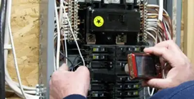 Home electrical inspection of circuit breaker panel by licensed electrician in Lakeland, FL