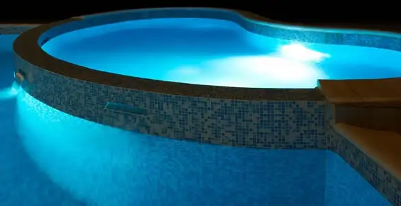 pool light installation and repair services highlighting illuminated pool interior lighting in Lakeland, FL