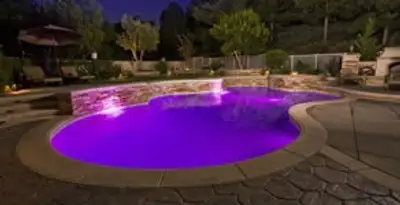 pool light installation and repair services illuminating a residential swimming pool in Lakeland, FL