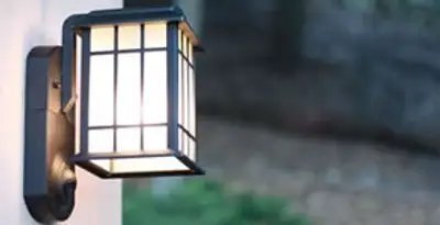 security light installation services with professionally mounted exterior wall light in Lakeland, FL