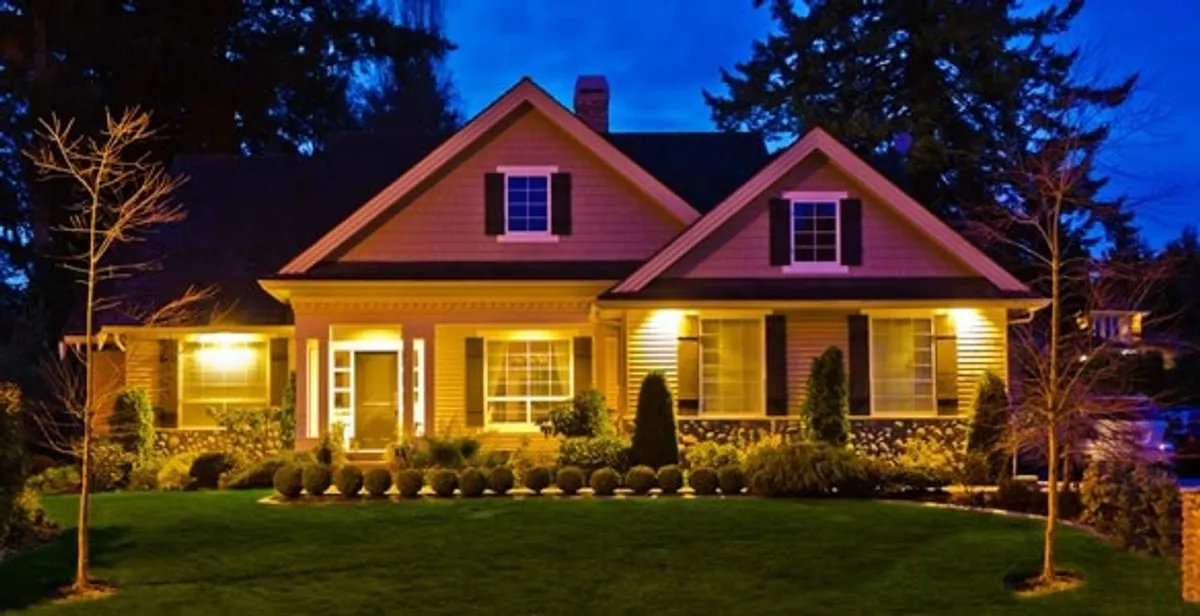 security light installation services illuminating a residential exterior at night in Lakeland, FL